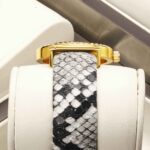 Women's Hollow Dial Quartz Watch - Snake-Pattern Alloy Strap, Diamond-Accent Bracelet Style, Waterproof Analog Timepiece - Image 2